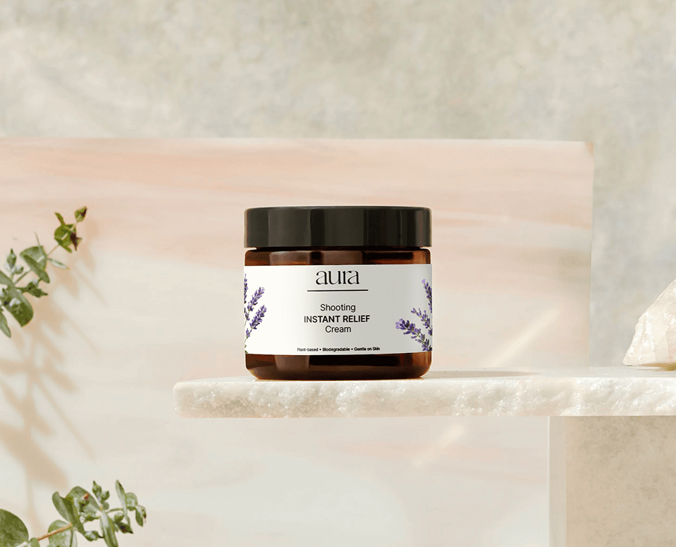 Aura branding: cosmetic cream jar on a marble shelf